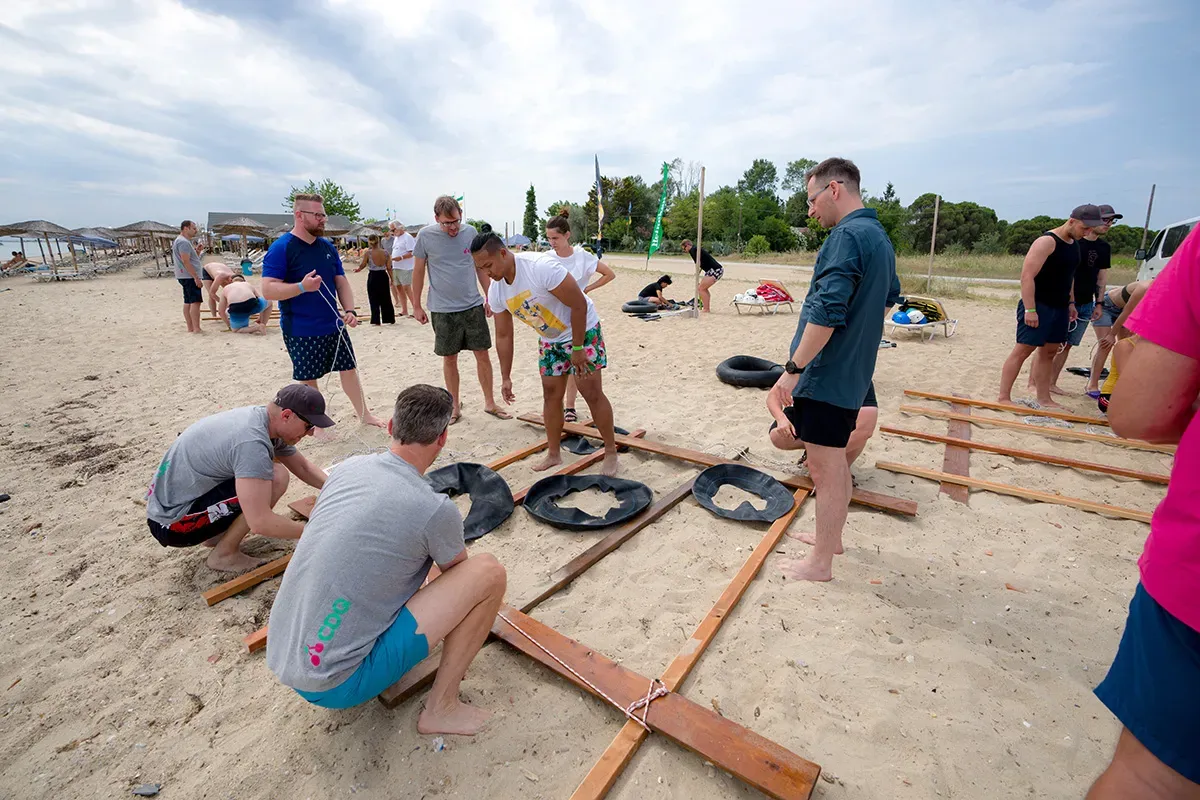 CDQ colleagues building rafts